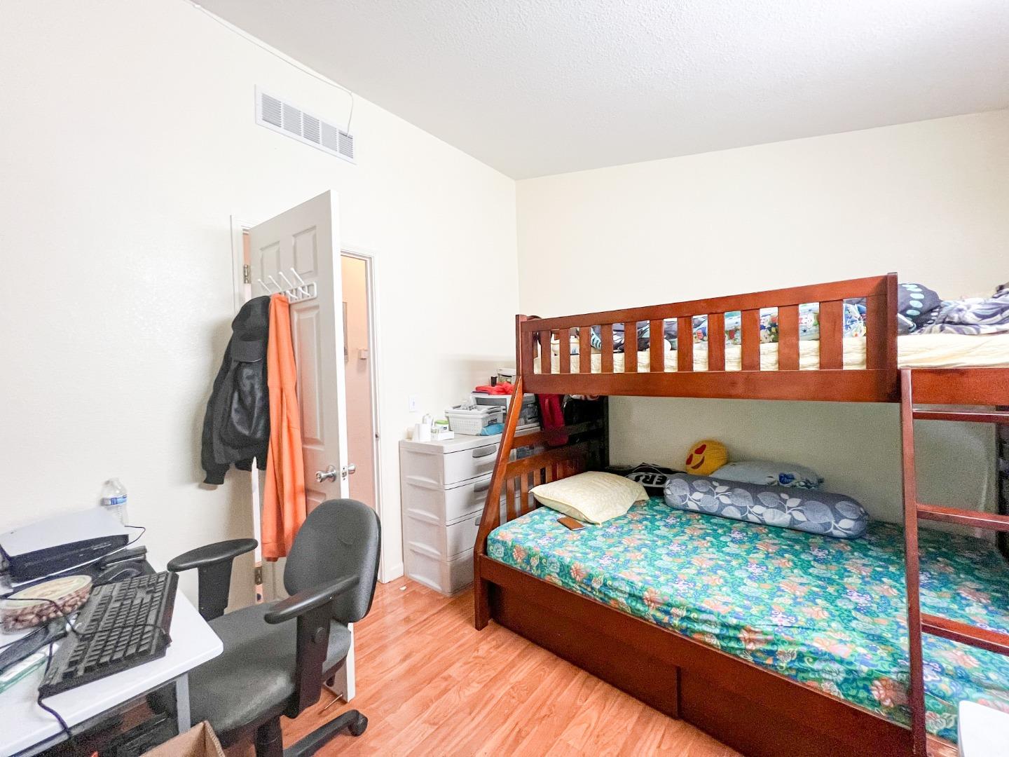 555 Umbarger Road, Unit 30 San Jose, CA 95111 - Photo 10 of 15 a bedroom with furniture and a window