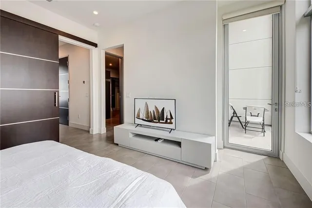 a couple of table and chairs in front of a building