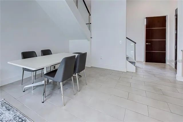 a view of a livingroom with furniture and natural light
