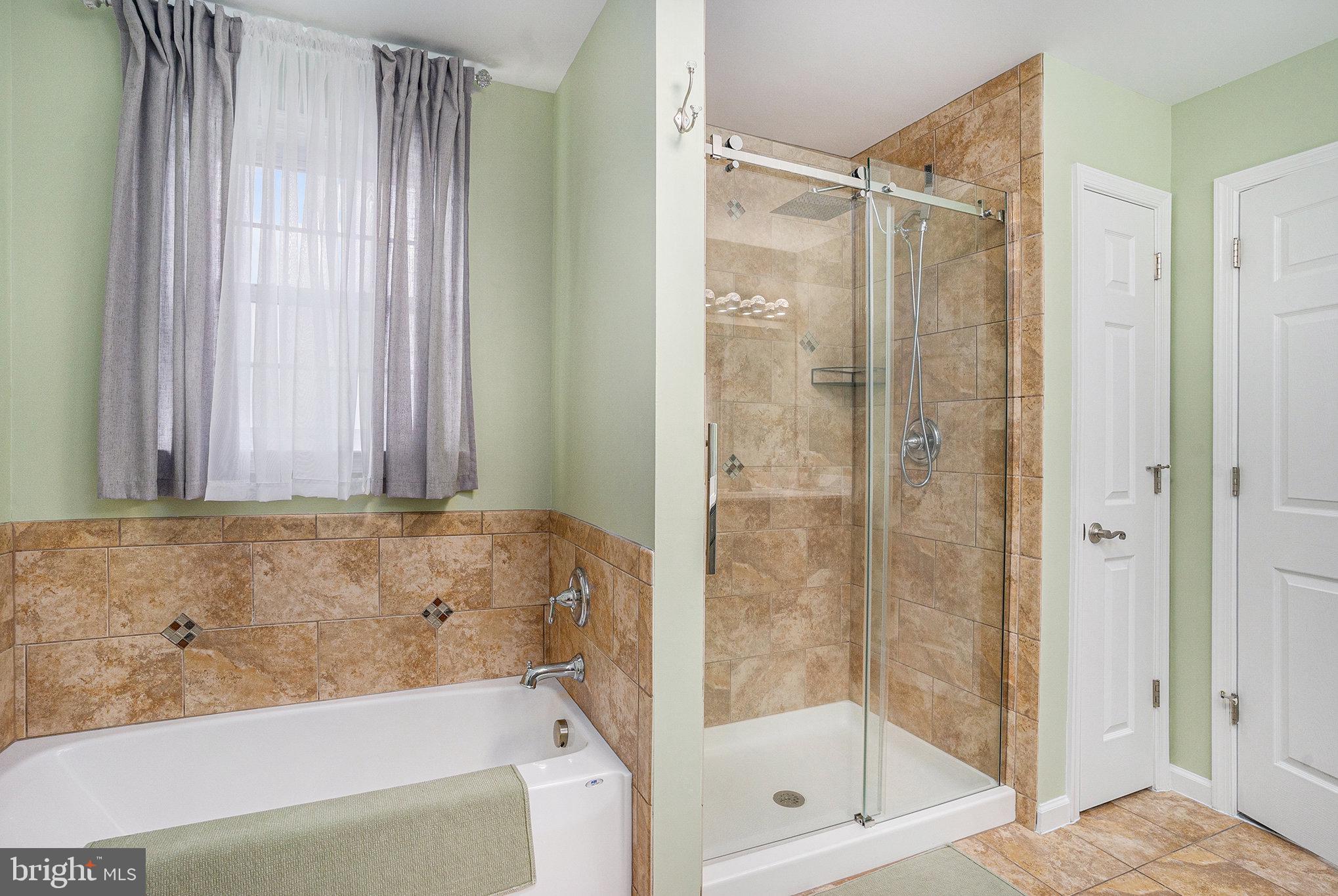 472 Evansburg Road Collegeville, PA 19426 - Photo 27 of 48 a bathroom with a shower and a bathtub