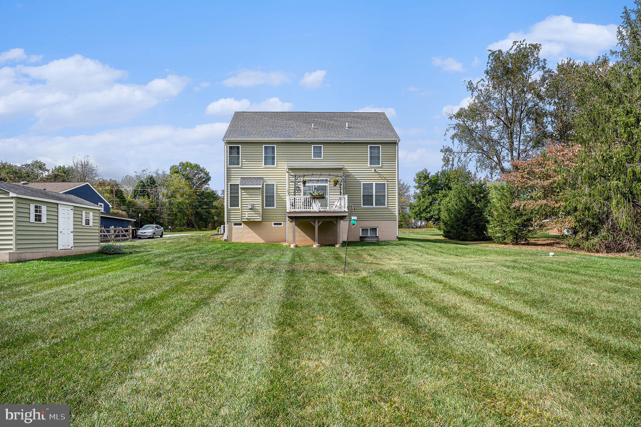 472 Evansburg Road Collegeville, PA 19426 - Photo 4 of 48 a front view of a house with a yard