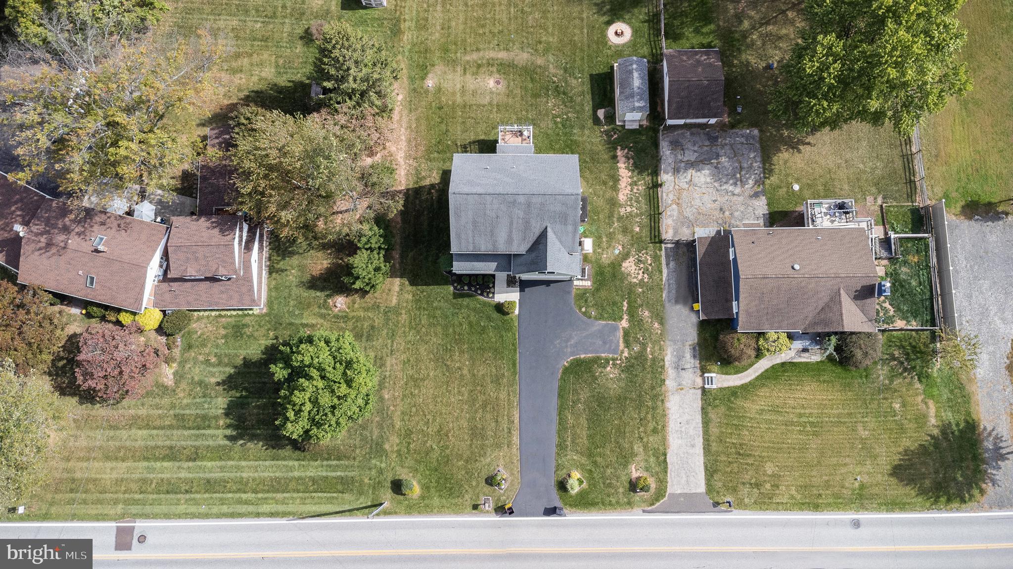 472 Evansburg Road Collegeville, PA 19426 - Photo 44 of 48 aerial view of a house with swimming pool
