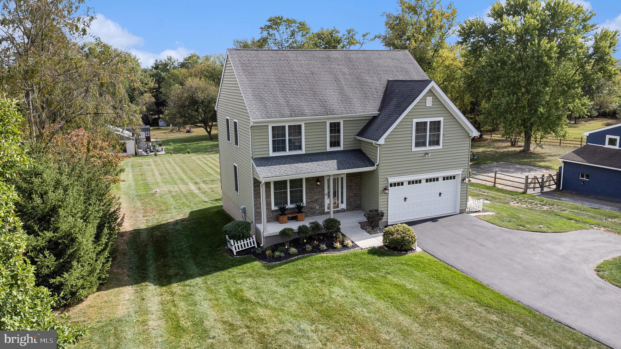 472 Evansburg Road Collegeville, PA 19426 - Photo 5 of 48 a aerial view of a house with garden