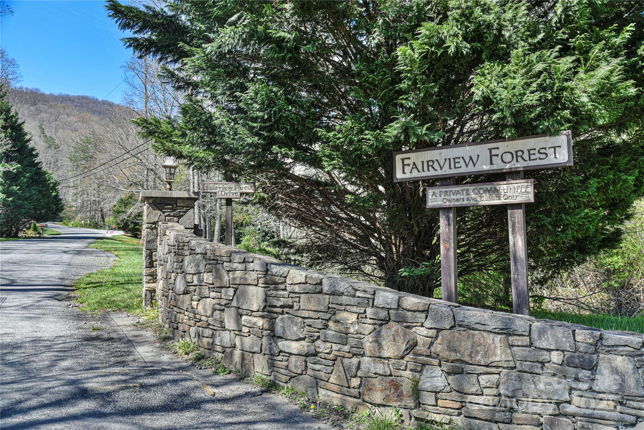 89 Weeping Cherry Forest Road Fairview, NC 28730 - Photo 15 of 15 a sign that is on the side of a road