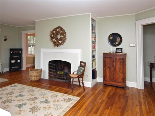 2 Kent Road Needham, MA 02492 - Photo 4 of 14 a living room with furniture and a fireplace