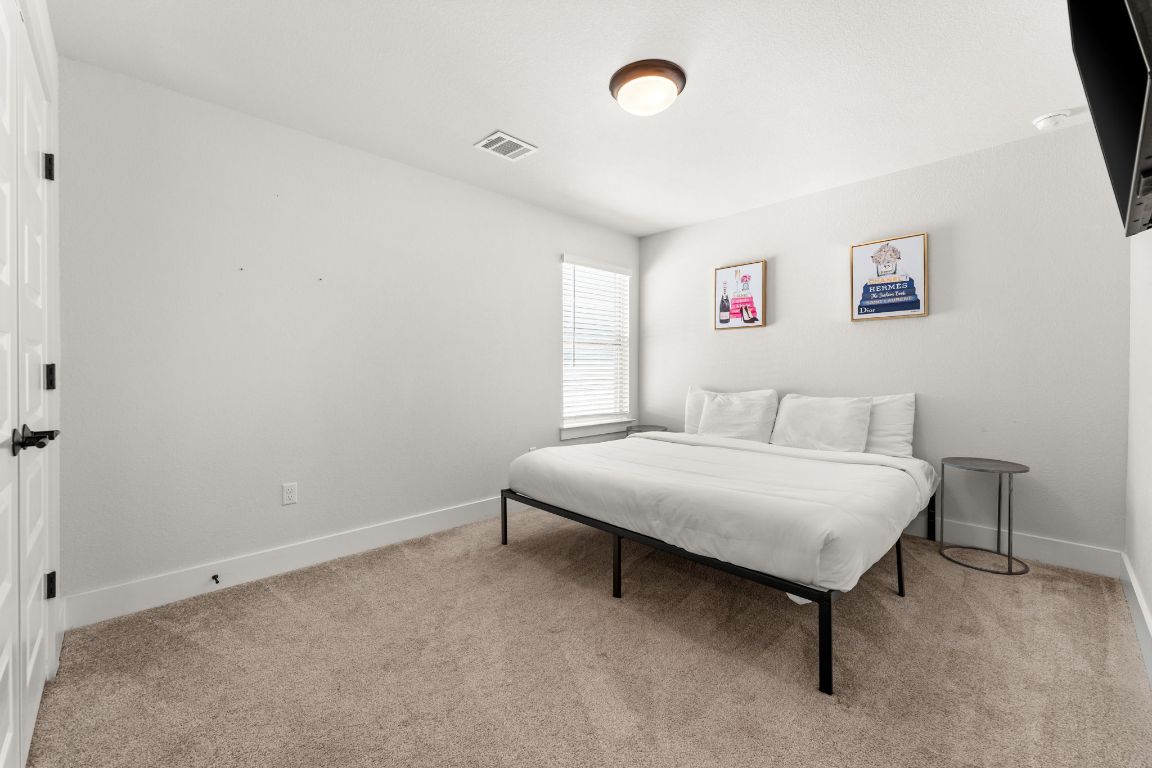 8512 McKamy Drive Austin, TX 78744 - Photo 24 of 28 Spacious layouts offer plenty of room for rest or creativity.