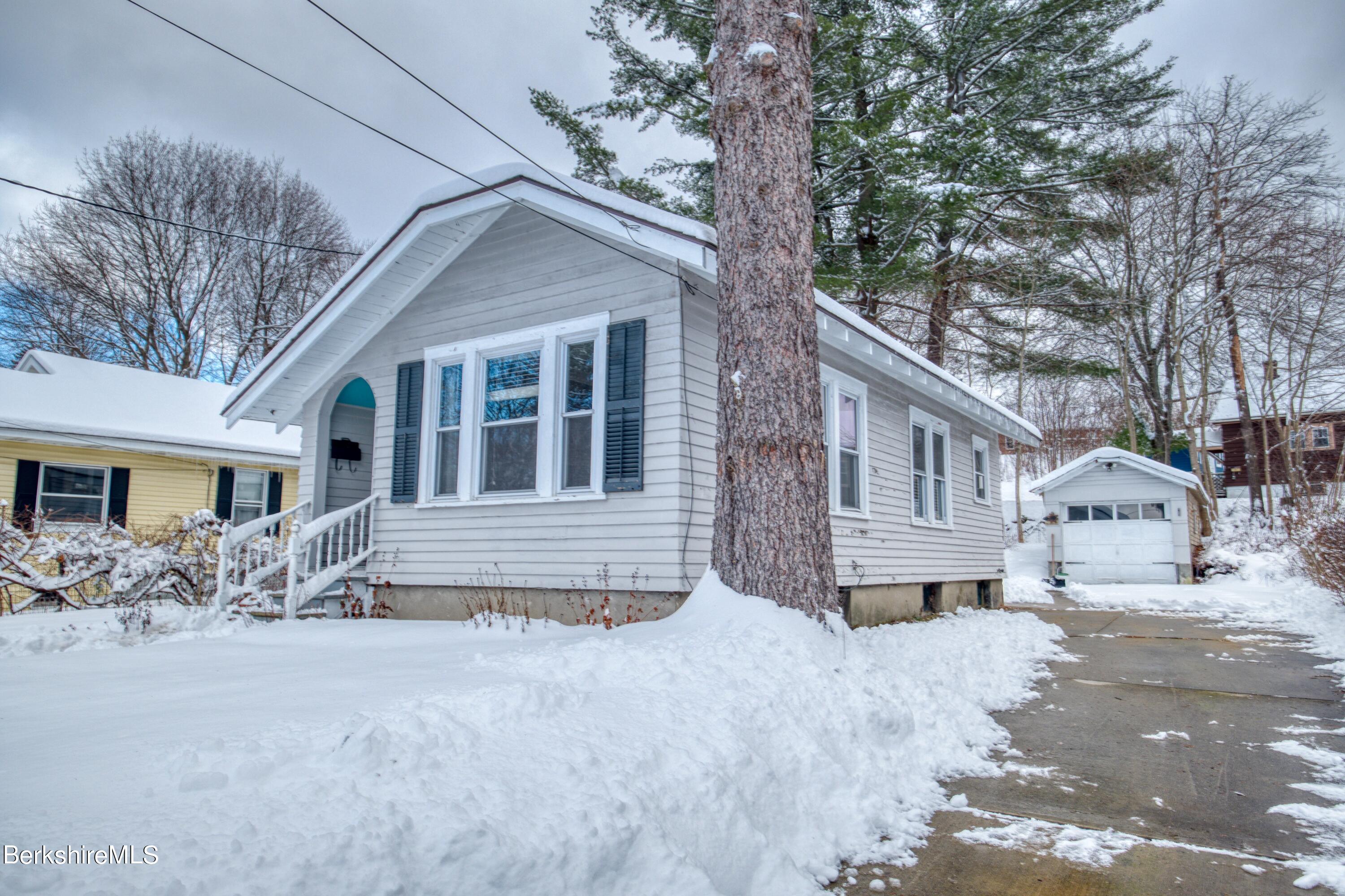 39 Catherine Street Pittsfield, MA 01201 - Photo 3 of 26 a view of a house with a large tree