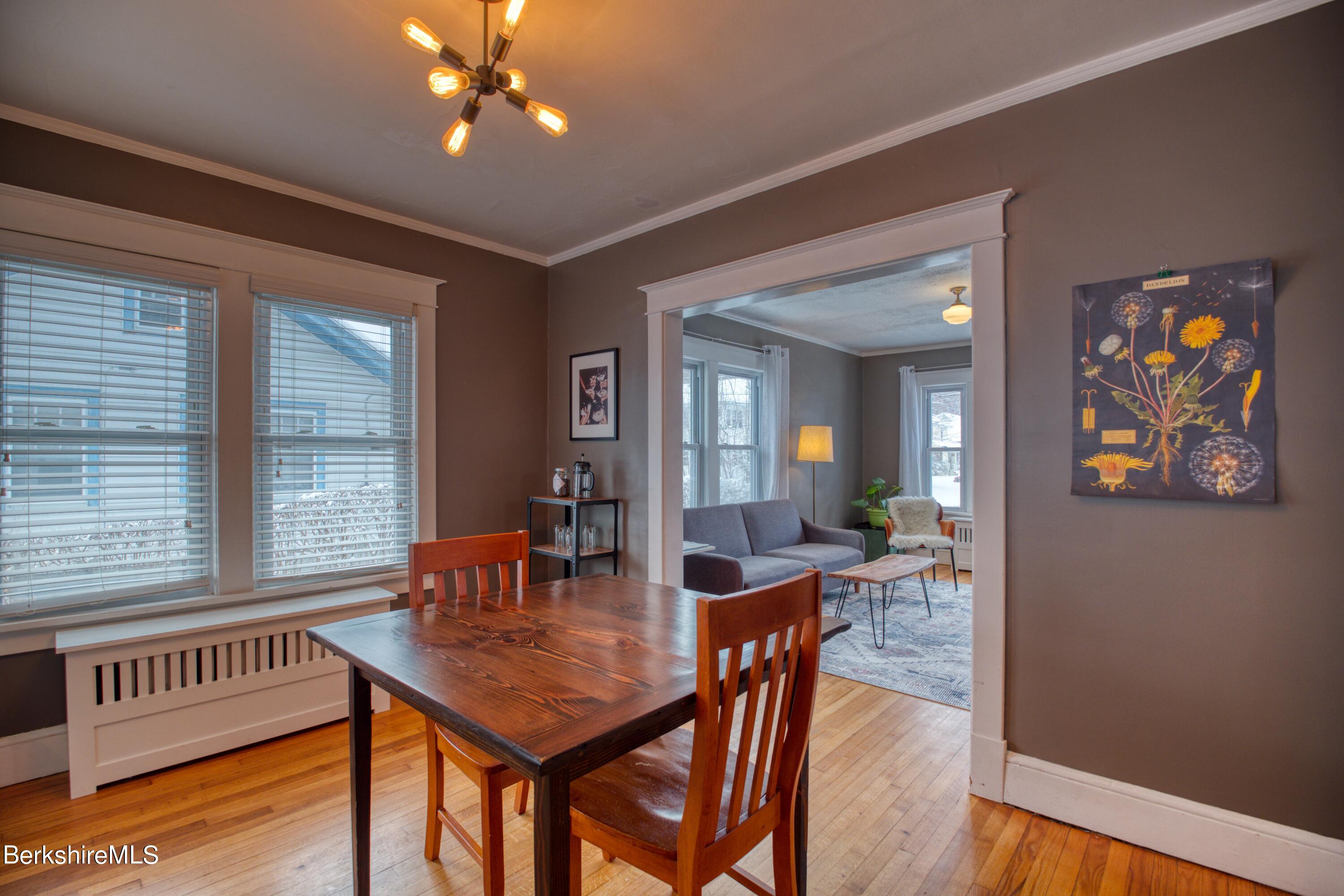 39 Catherine Street Pittsfield, MA 01201 - Photo 8 of 26 a view of a dining room with furniture window and wooden floor
