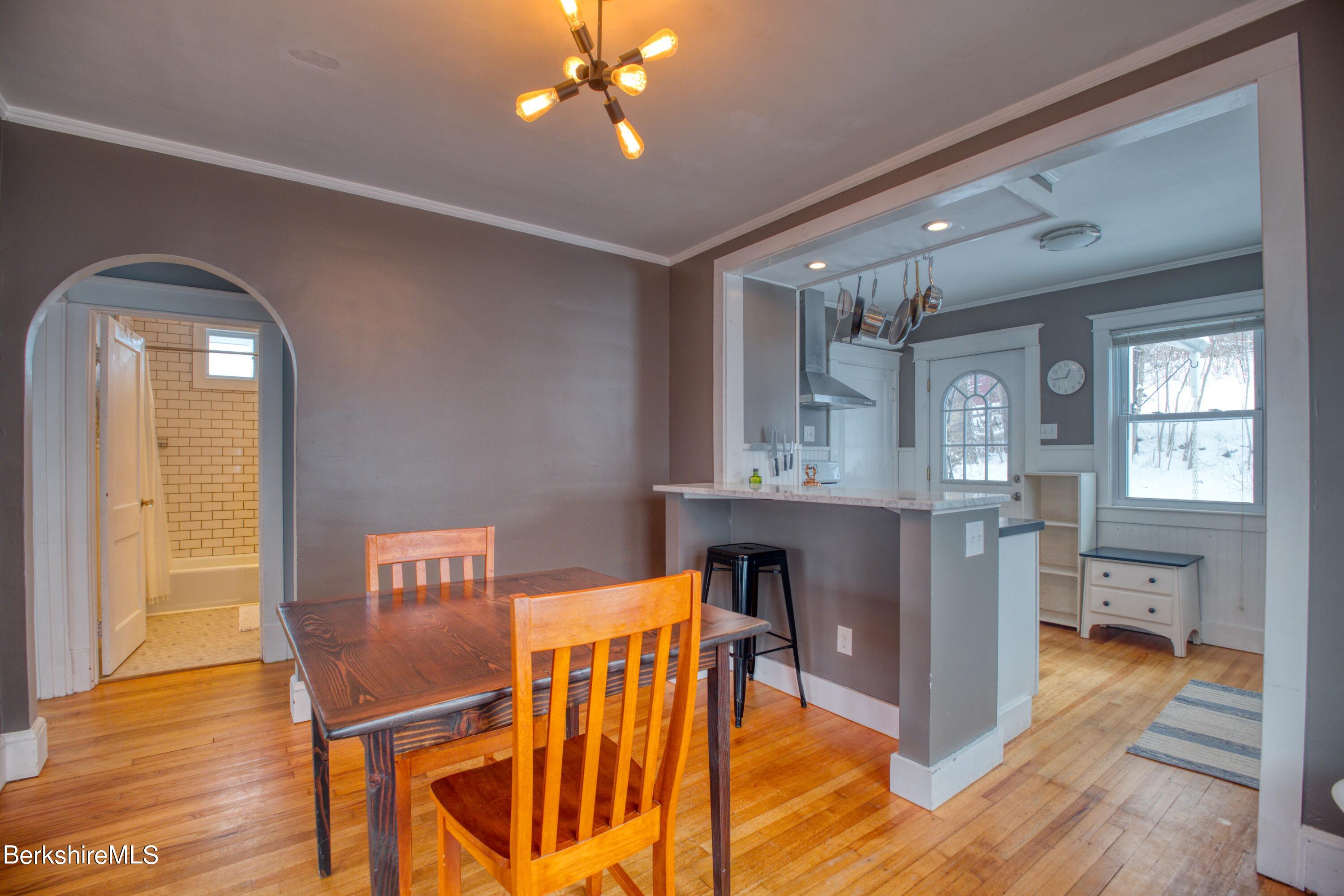 39 Catherine Street Pittsfield, MA 01201 - Photo 10 of 26 a view of kitchen with furniture and wooden floor
