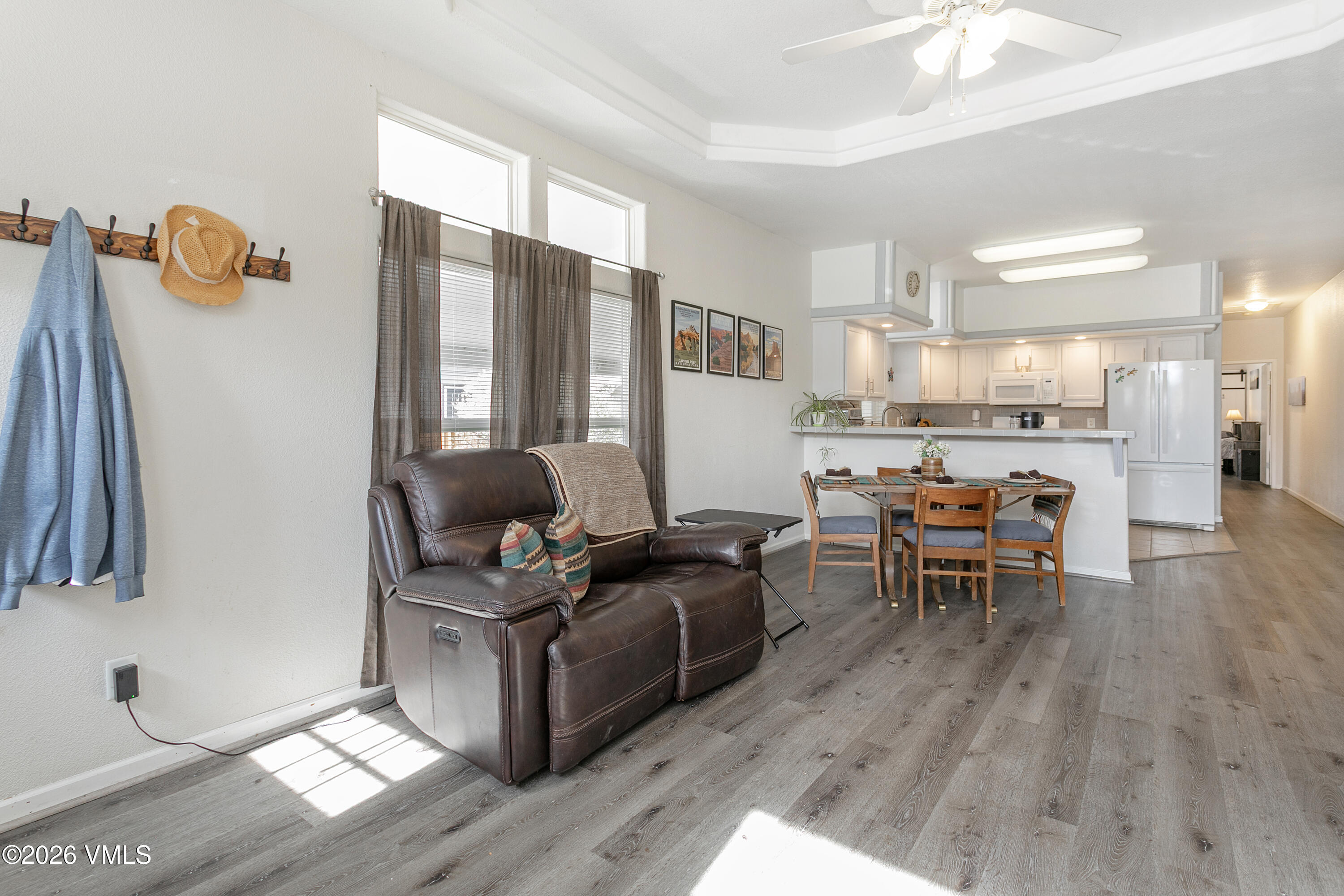 161 Haymaker Loop Gypsum, CO 81637 - Photo 4 of 40 a living room with furniture and a table