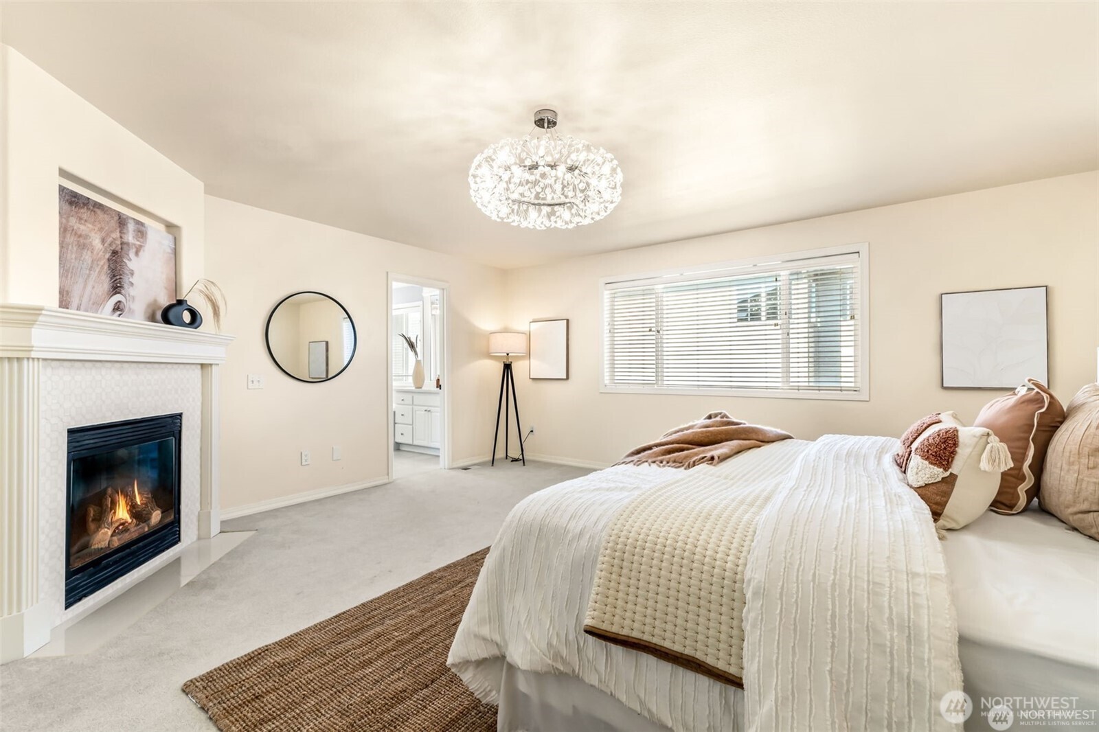 3631 214th Place Southeast Bothell, WA 98021 - Photo 21 of 38 a bedroom with a bed and a fireplace