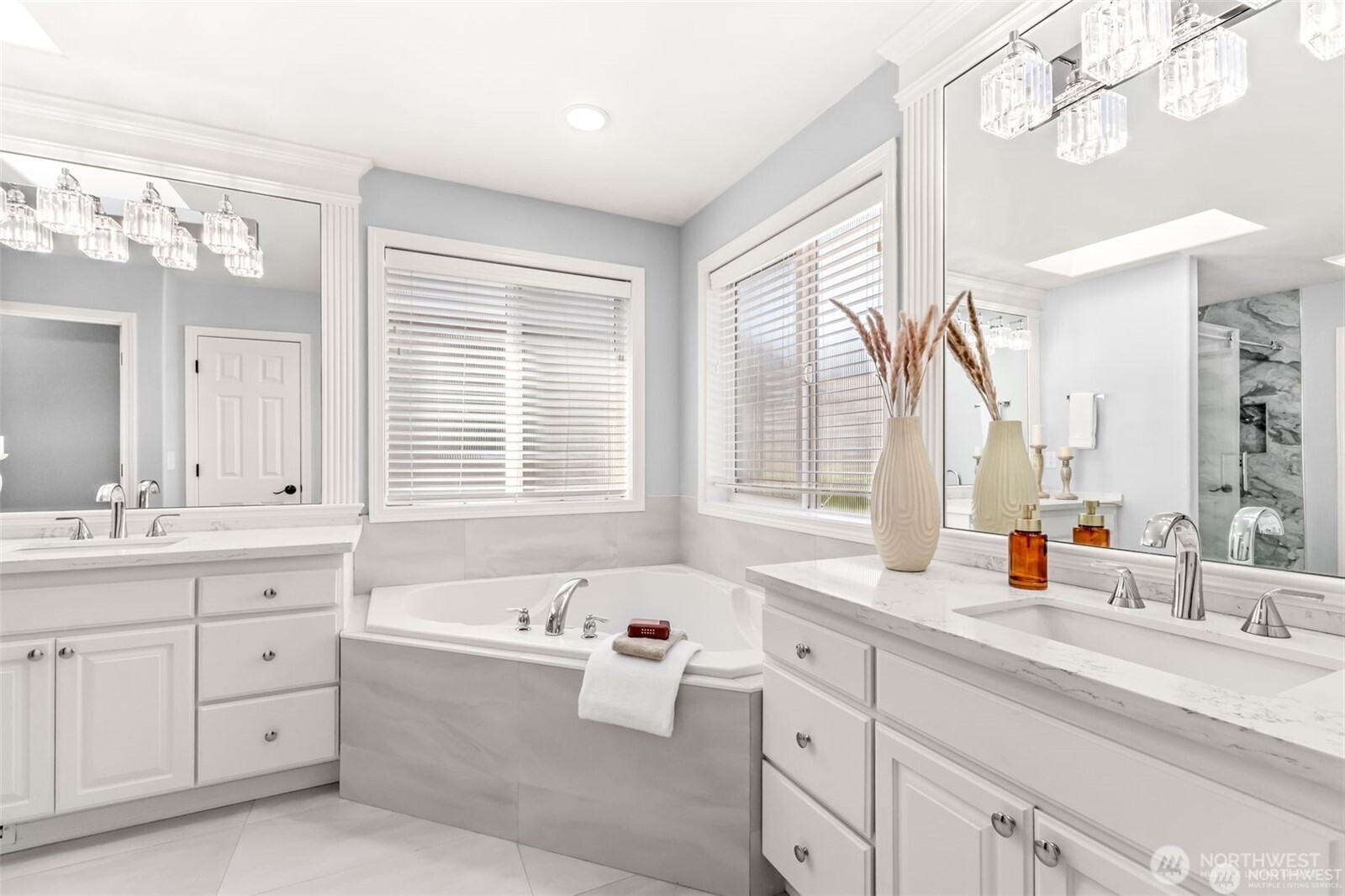 3631 214th Place Southeast Bothell, WA 98021 - Photo 22 of 38 a bathroom with a sink mirror double vanity and window