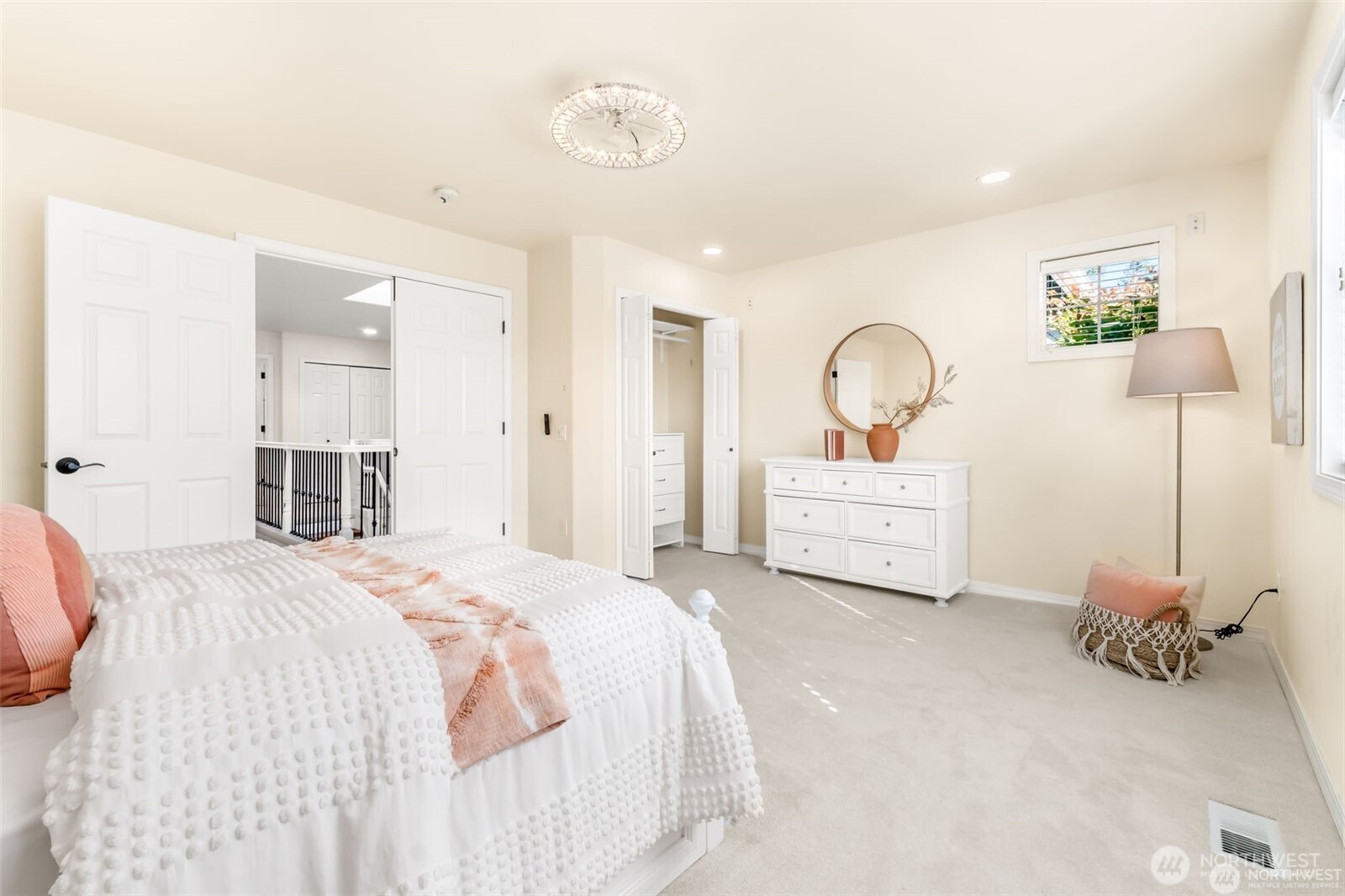 3631 214th Place Southeast Bothell, WA 98021 - Photo 25 of 38 a spacious bedroom with a bed and a cabinets