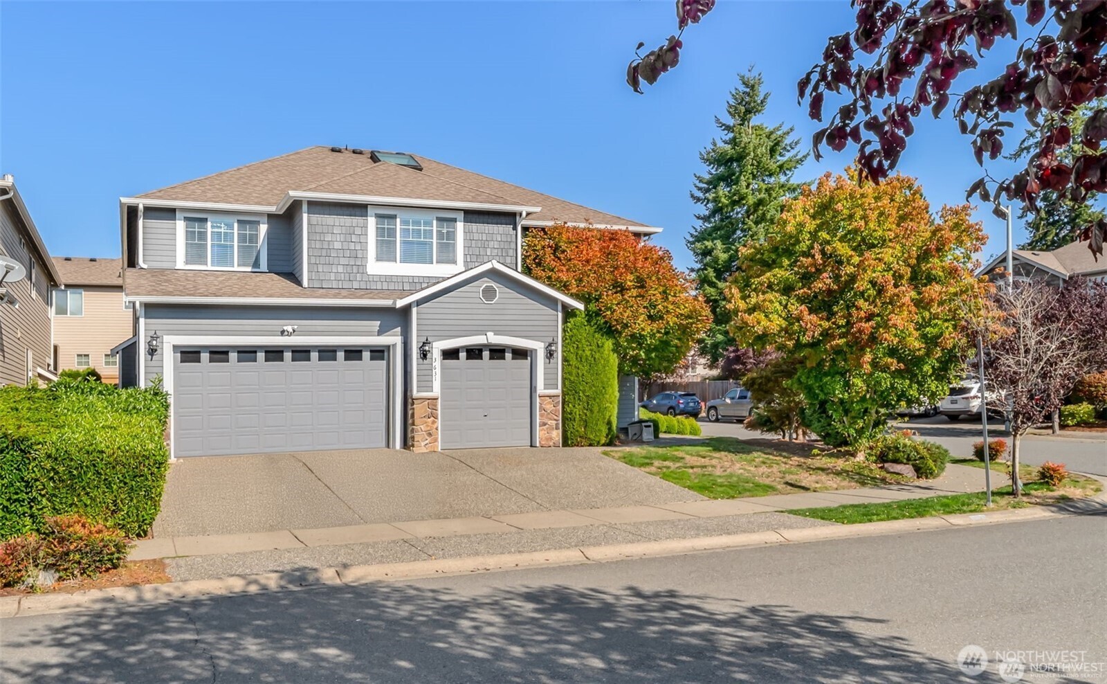 3631 214th Place Southeast Bothell, WA 98021 - Photo 33 of 38 a front view of a house with a yard