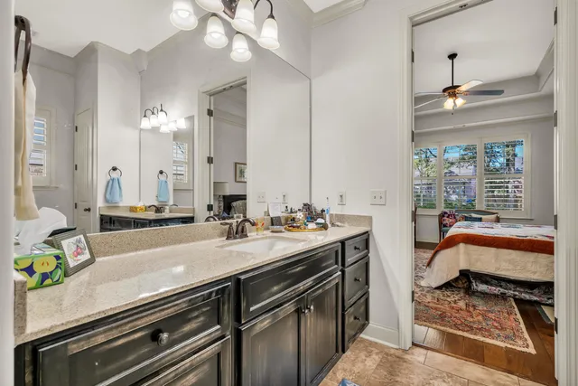 a spacious kitchen with a stove and a sink