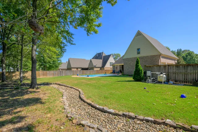 a garden view with a seating space
