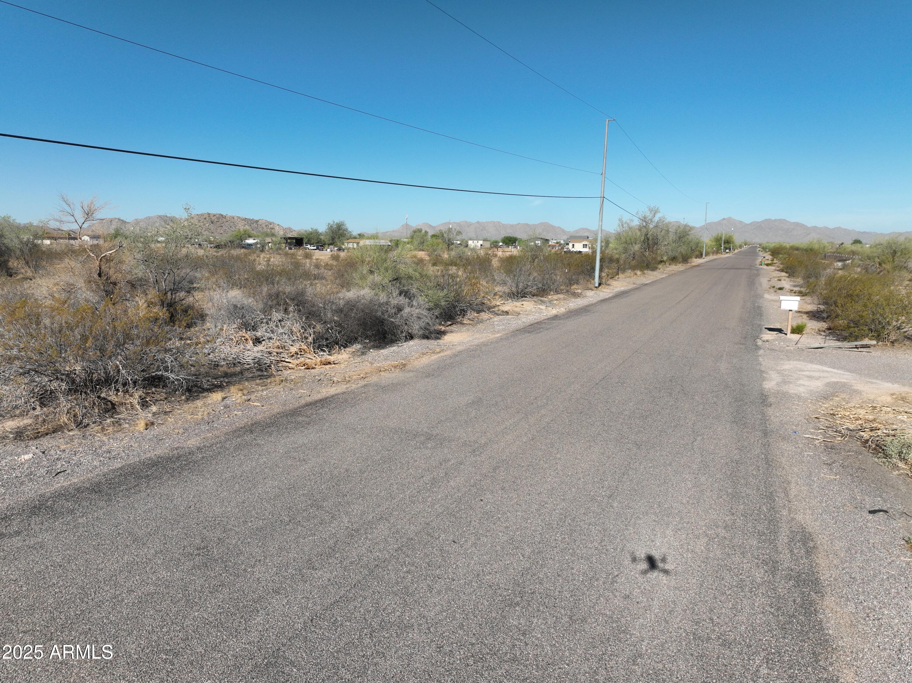 0 West Huisatch Road, Unit 191 Maricopa, AZ 85139 - Photo 9 of 20 a view of a road from a building