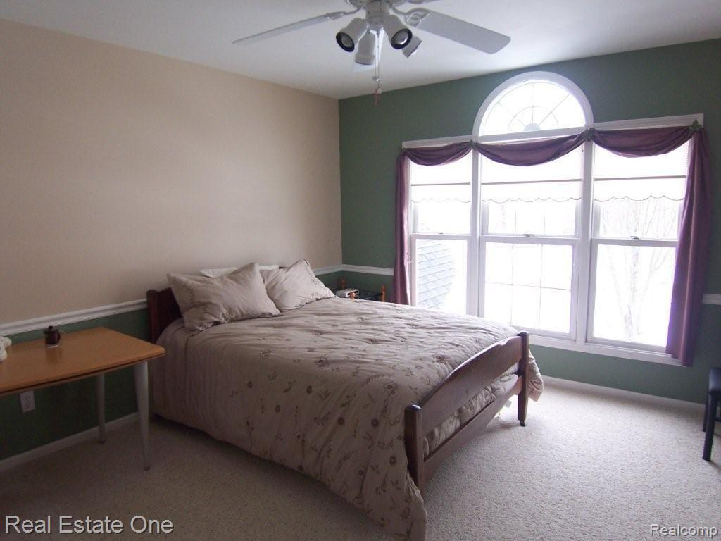 7635 Hunters Pointe Brighton, MI 48116 - Photo 19 of 25 Bedroom 2
