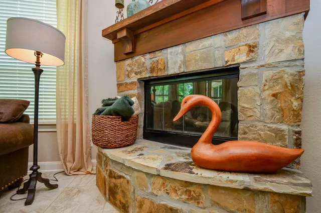 a room with furniture and a fireplace