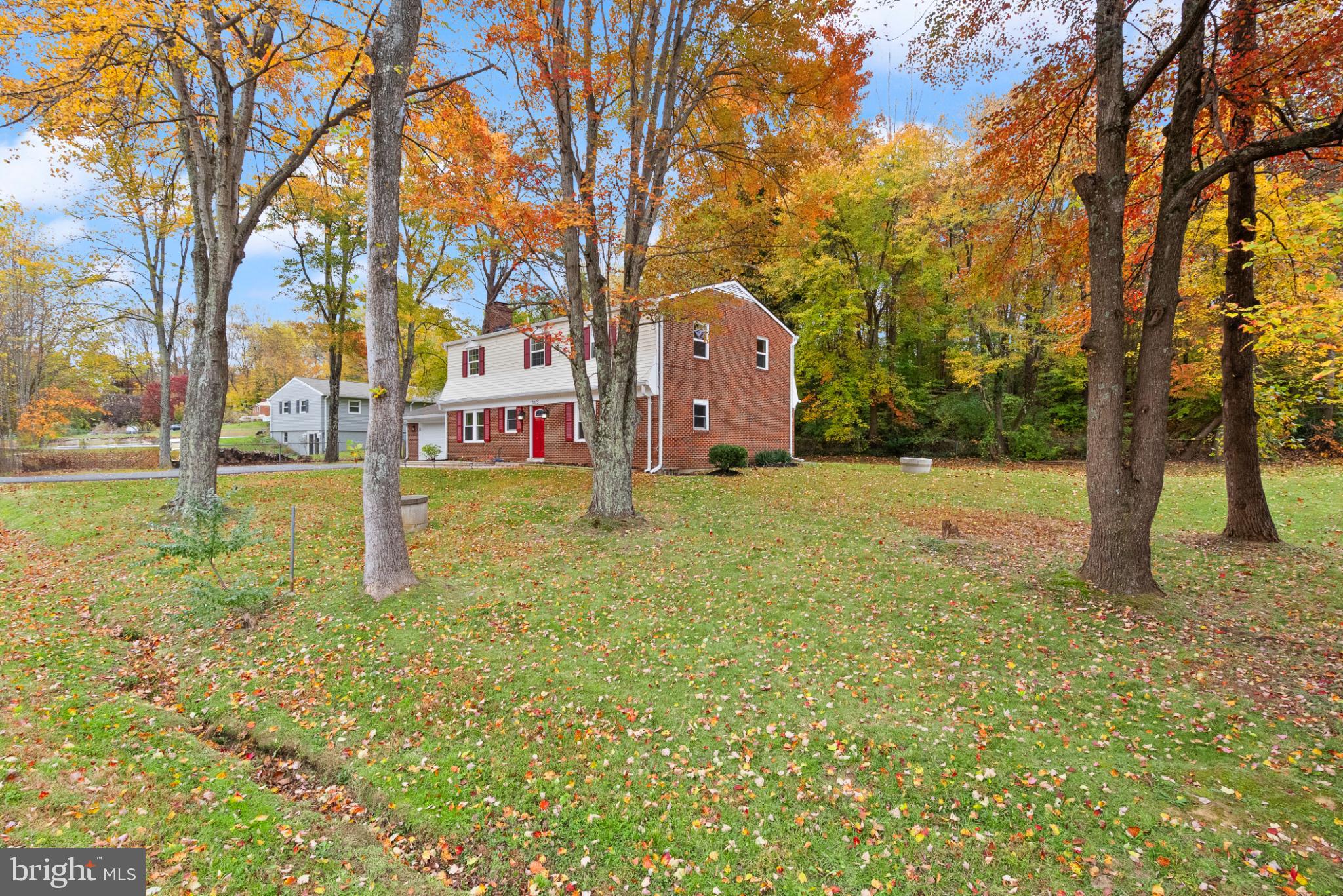 7075 Yates Ford Road Manassas, VA 20111 - Photo 3 of 54 Charming home amid vibrant autumn foliage.