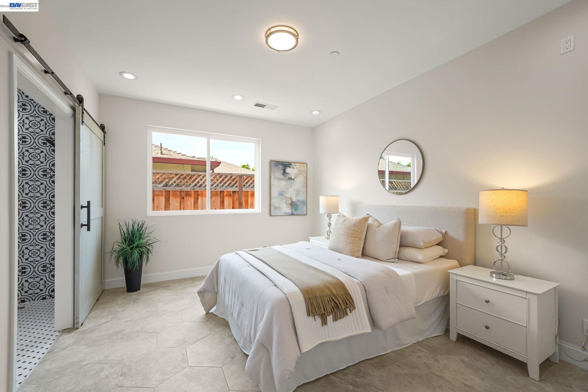 40772 Blacow Road Fremont, CA 94538 - Photo 23 of 40 a bedroom with bed and a window