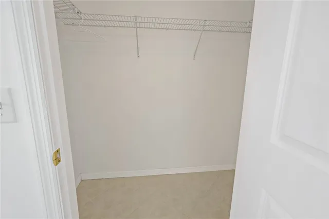 a bathroom with a toilet and a bathtub