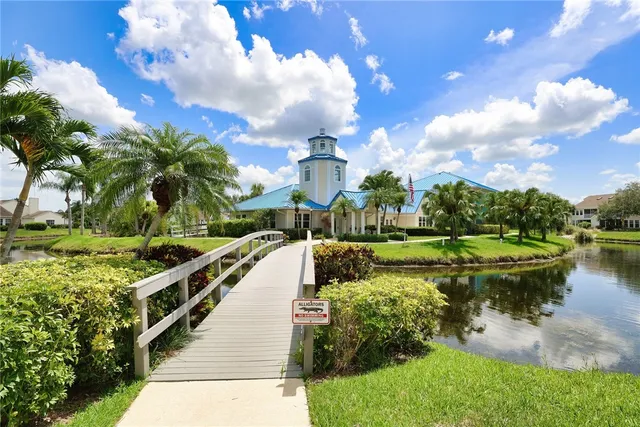 a view of a swimming pool with a patio