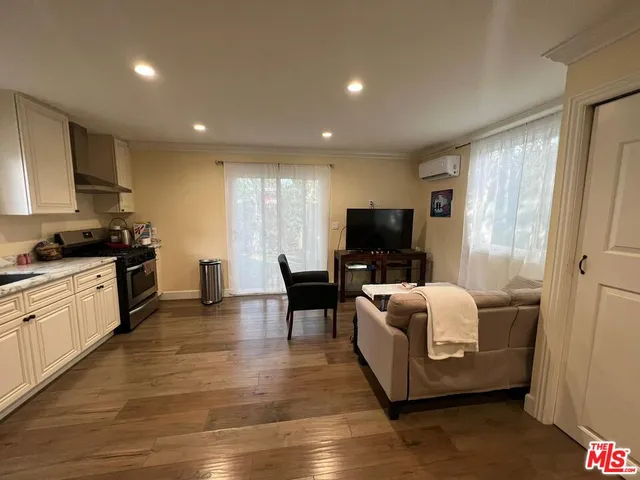 a bathroom with a sink a tub and shower