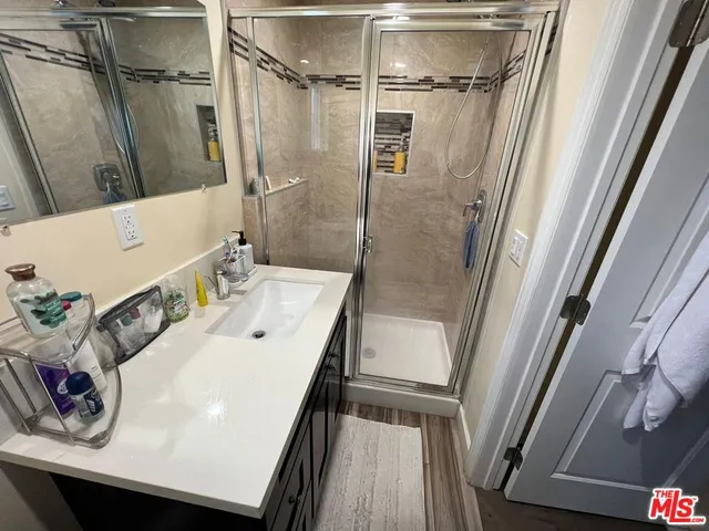 a view of a hallway with washer and dryer