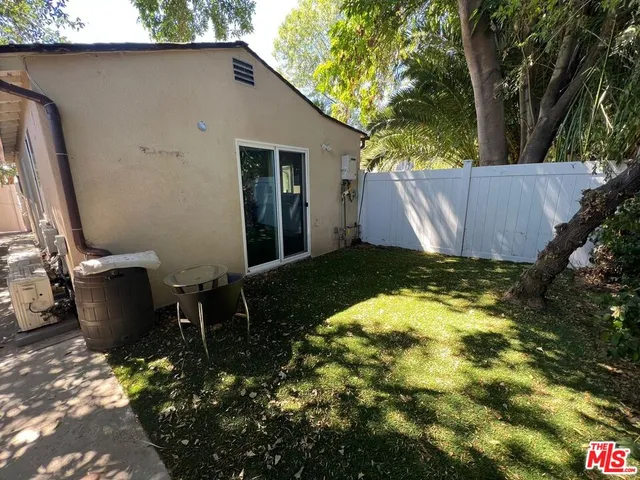 a view of a hallway with washer and dryer