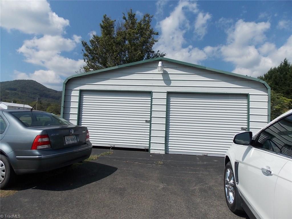 1384 Lumber Plant Road Lowgap, NC 27024 - Photo 4 of 19 2 Car Garage Stays