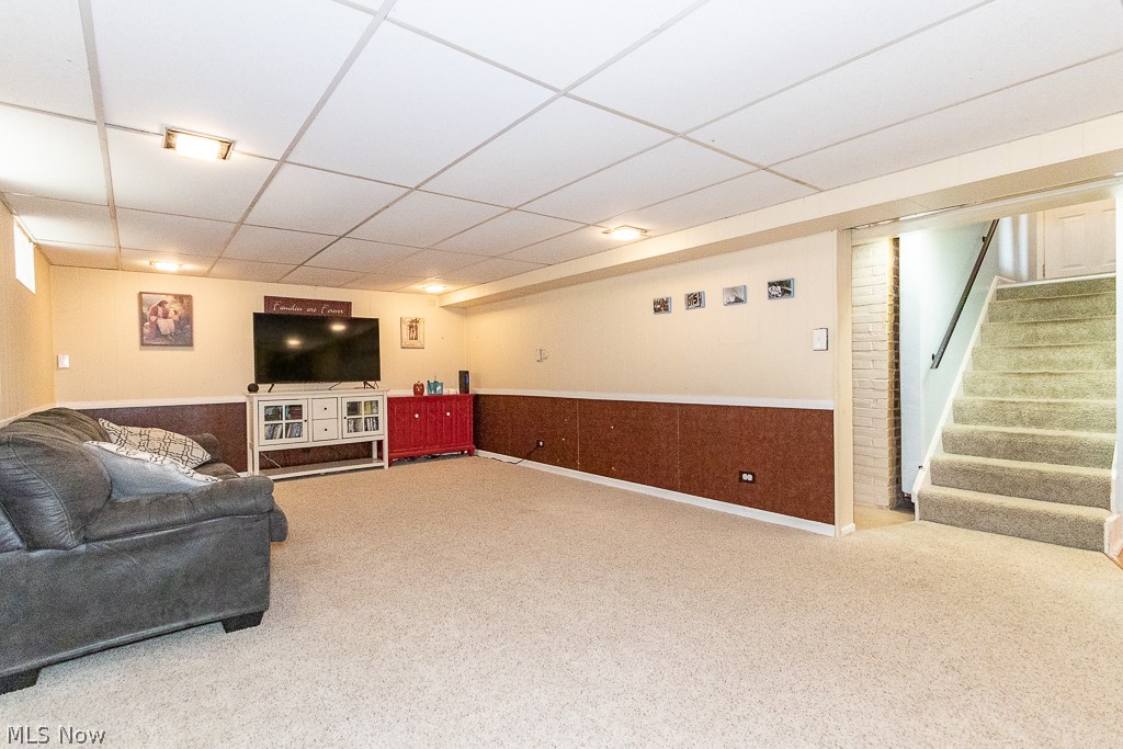 1140 Elmwood Road Cleveland, OH 44124 - Photo 21 of 29 Huge lower level recreation room. Carpet, block windows, plenty of lighting!