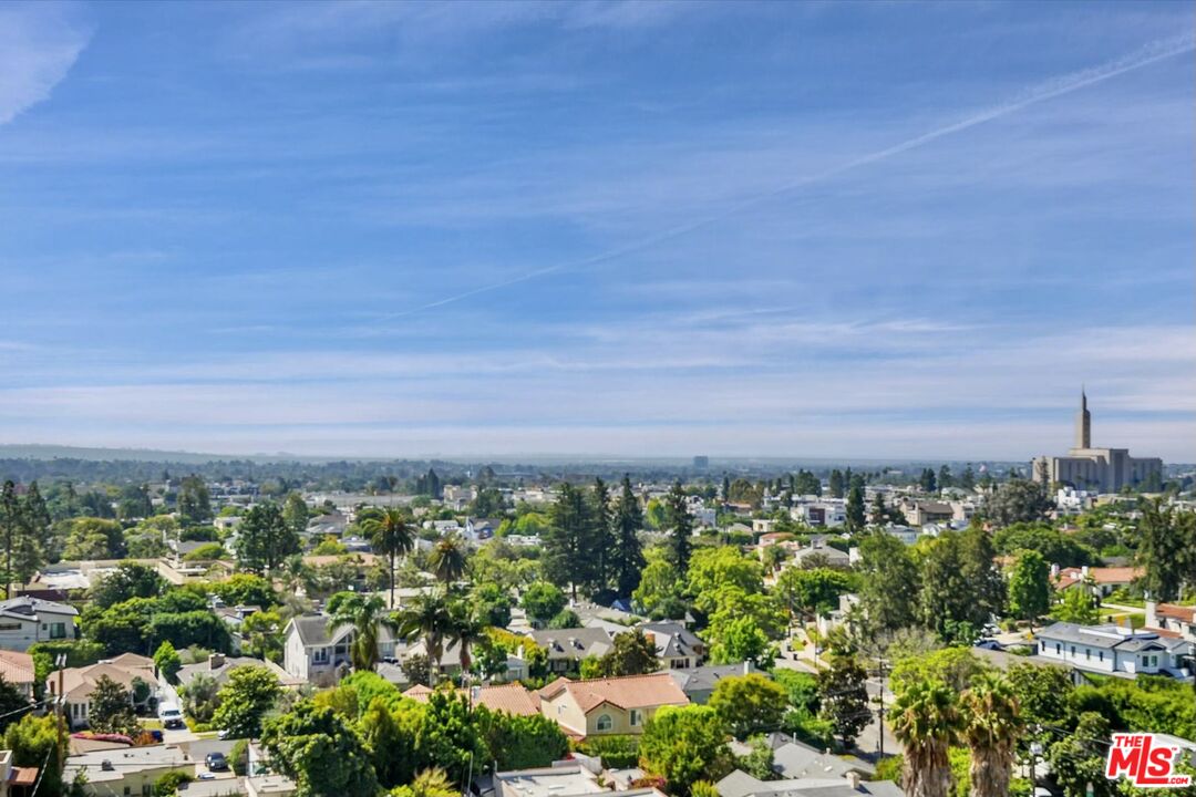 10580 Wilshire Boulevard, Unit 8SW Los Angeles, CA 90024 - Photo 22 of 38 an aerial view of a city and mountain view in back