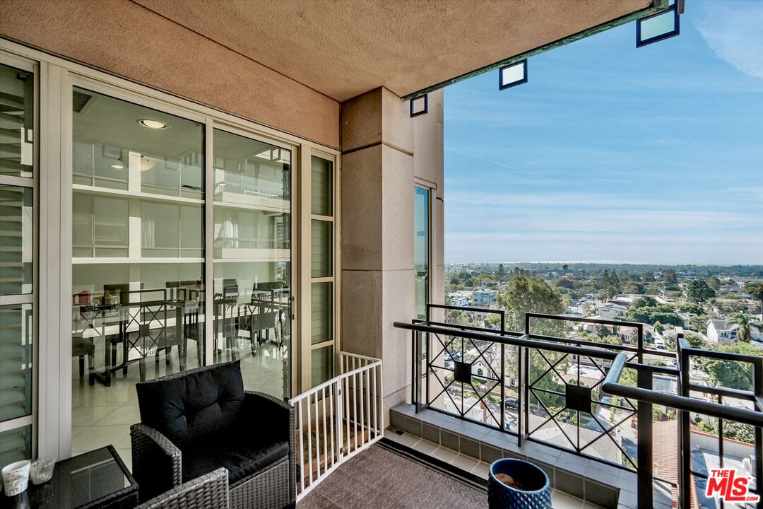 10580 Wilshire Boulevard, Unit 8SW Los Angeles, CA 90024 - Photo 23 of 38 a view of a balcony with chairs