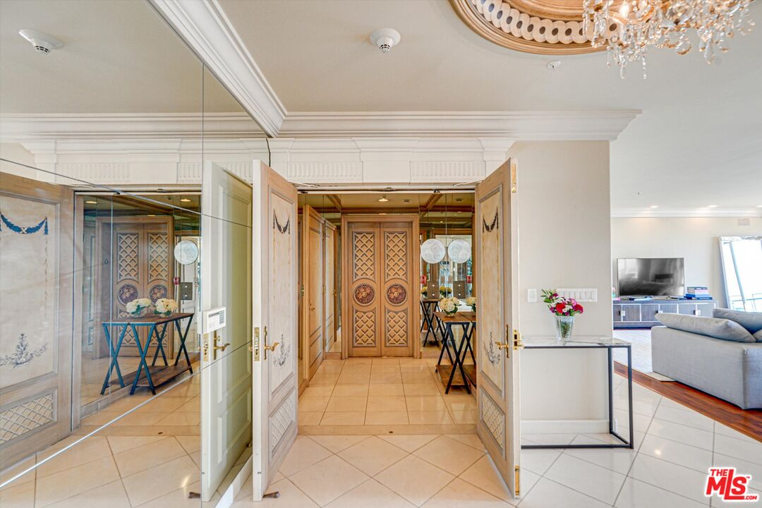 10580 Wilshire Boulevard, Unit 8SW Los Angeles, CA 90024 - Photo 4 of 38 a view of a hallway with dining area