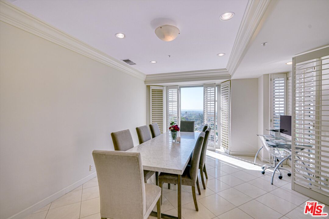 10580 Wilshire Boulevard, Unit 8SW Los Angeles, CA 90024 - Photo 9 of 38 a view of a dining room with furniture