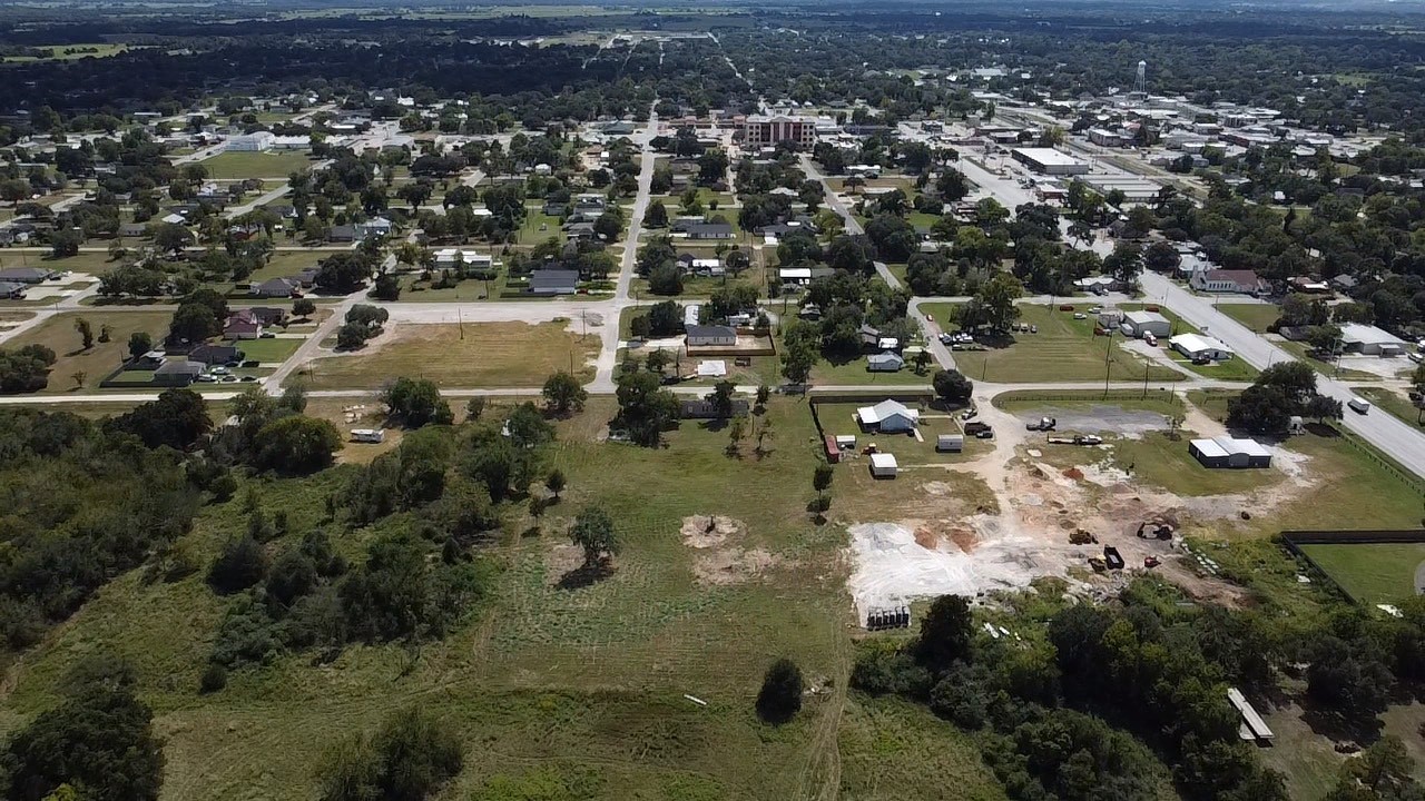 48 St Mary's Street Hempstead, TX 77445 - Photo 6 of 9 an aerial view of residential houses with outdoor space