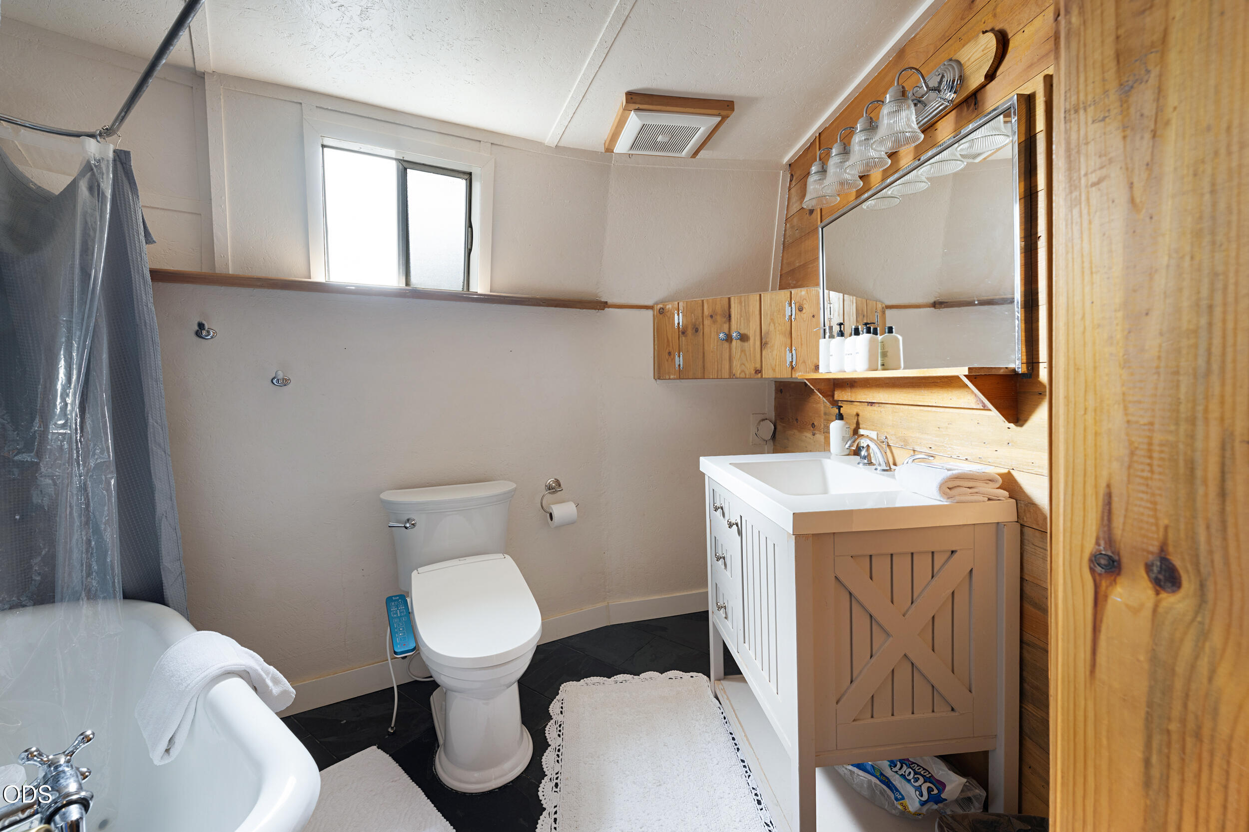 15453 Liberty Road La Pine, OR 97739 - Photo 16 of 48 Downstairs Bathroom with Clawfoot tub