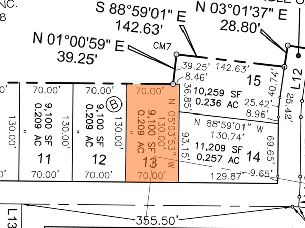 a view of a garden with houses
