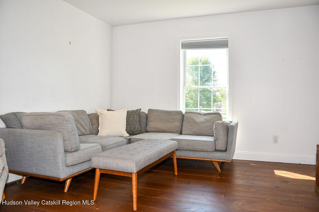 49 MacIntosh Drive Hudson, NY 12534 - Photo 18 of 39 a living room with furniture and a window