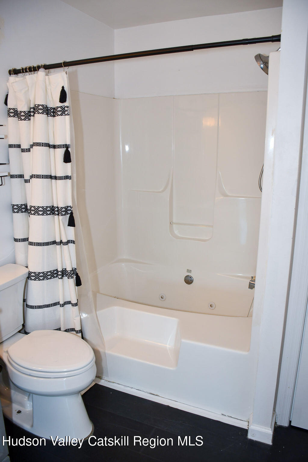 49 MacIntosh Drive Hudson, NY 12534 - Photo 23 of 39 a bathroom with a bathtub and shower