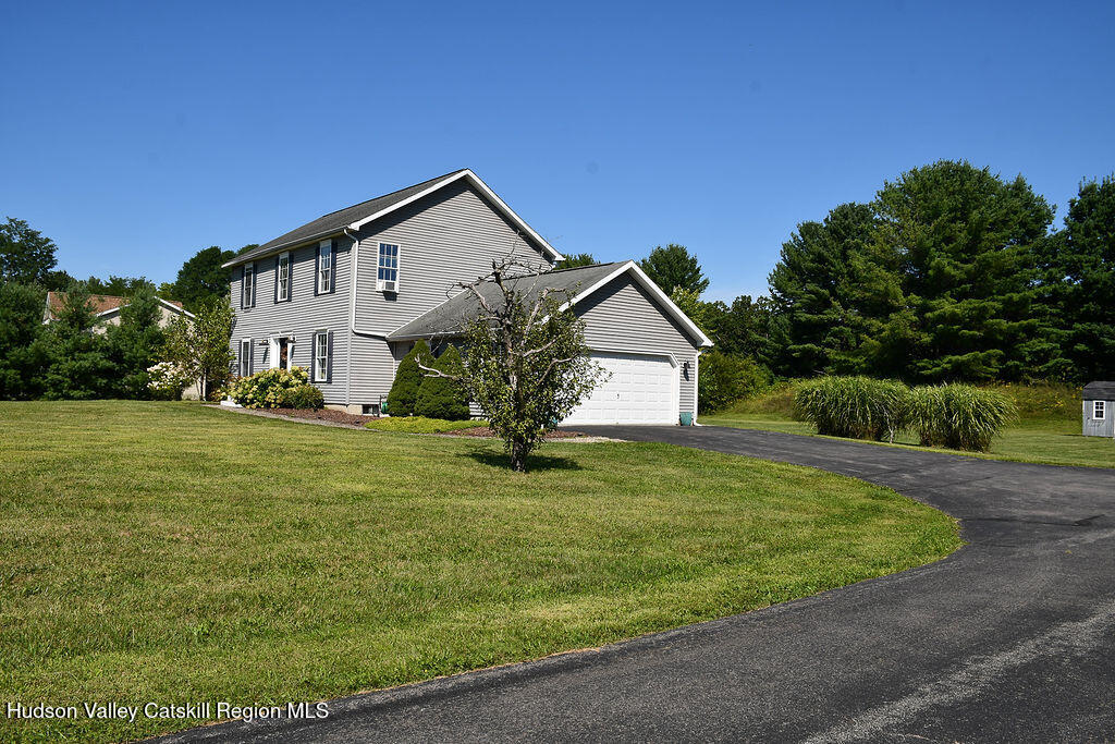 49 MacIntosh Drive Hudson, NY 12534 - Photo 37 of 39 a view of a house with a yard
