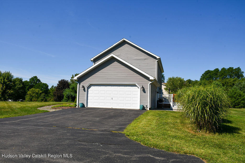 49 MacIntosh Drive Hudson, NY 12534 - Photo 39 of 39 a view of a house with a yard and garage