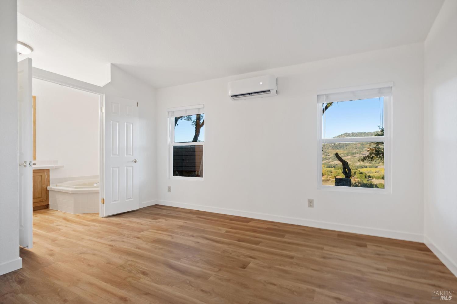 27770 Asti Road Cloverdale, CA 95425 - Photo 19 of 35 a view of empty room with wooden floor