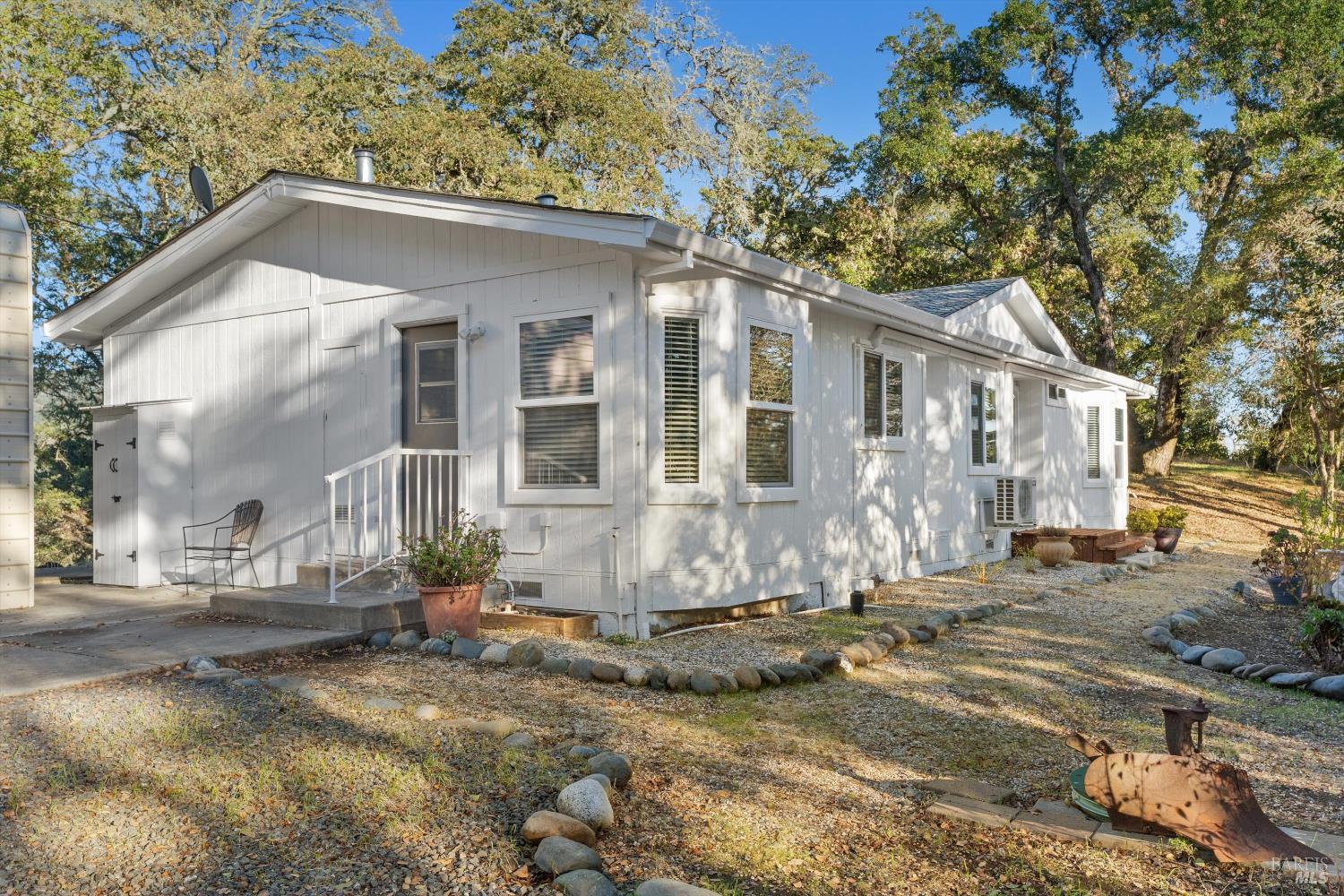 27770 Asti Road Cloverdale, CA 95425 - Photo 2 of 35 a view of a house with a yard