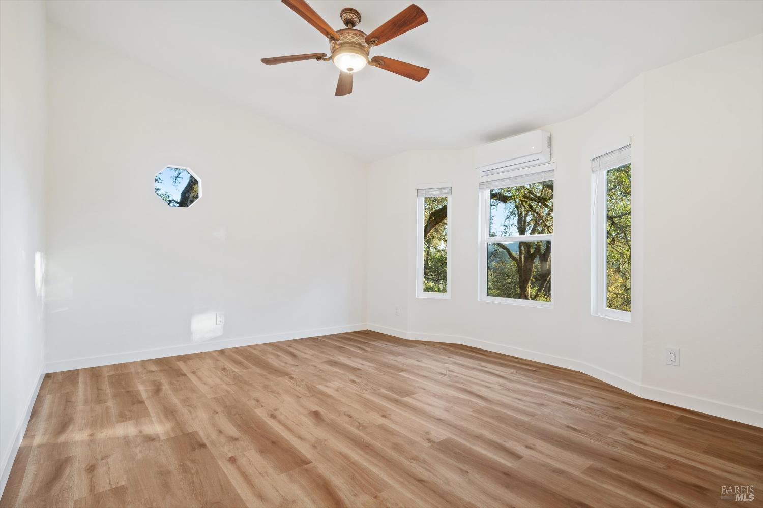 27770 Asti Road Cloverdale, CA 95425 - Photo 24 of 35 an empty room with windows