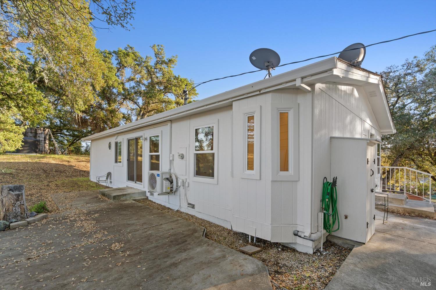 27770 Asti Road Cloverdale, CA 95425 - Photo 29 of 35 a front view of a house with garden