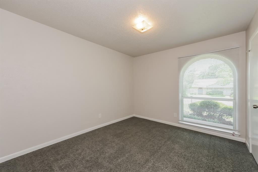 1816 Christopher Drive Fort Worth, TX 76140 - Photo 12 of 16 an empty room with windows