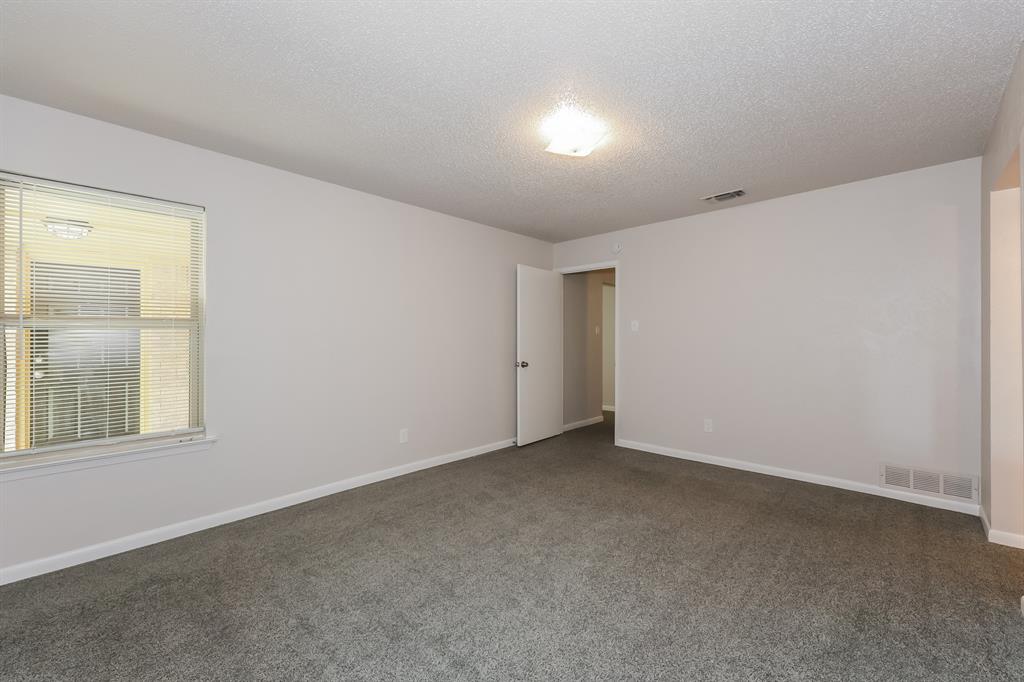 1816 Christopher Drive Fort Worth, TX 76140 - Photo 9 of 16 an empty room with a window