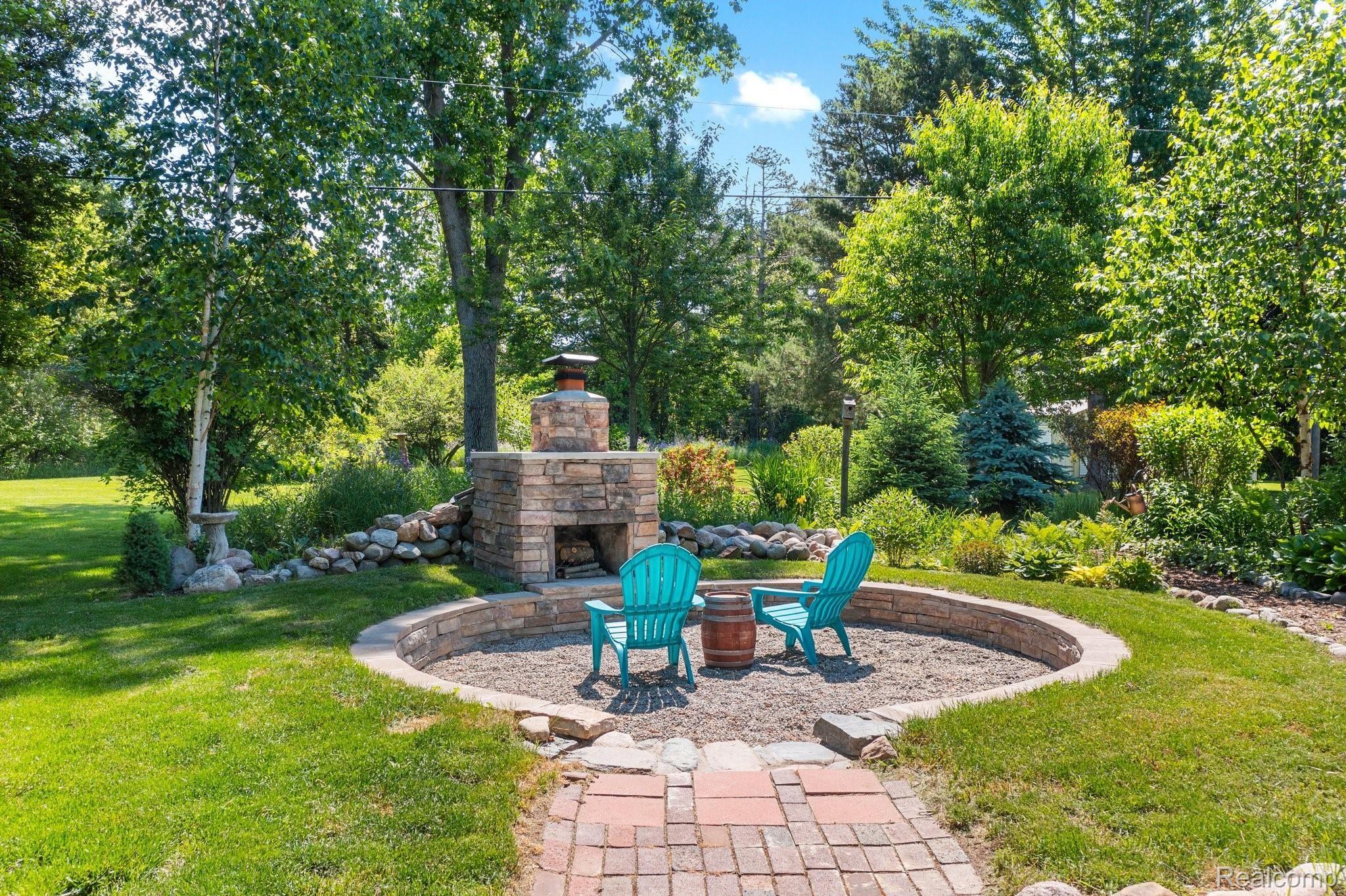 4721 Rochester Road Dryden, MI 48428 - Photo 24 of 33 Built in outdoor fireplace.